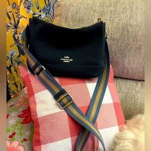 Coach purse never been used. Blue Jean color.